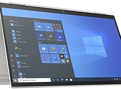 تصویر لپ‌تاپ HP EliteBook X360 1040 G8 در حالت لپ‌تاپ روی میز کار با نور طبیعی